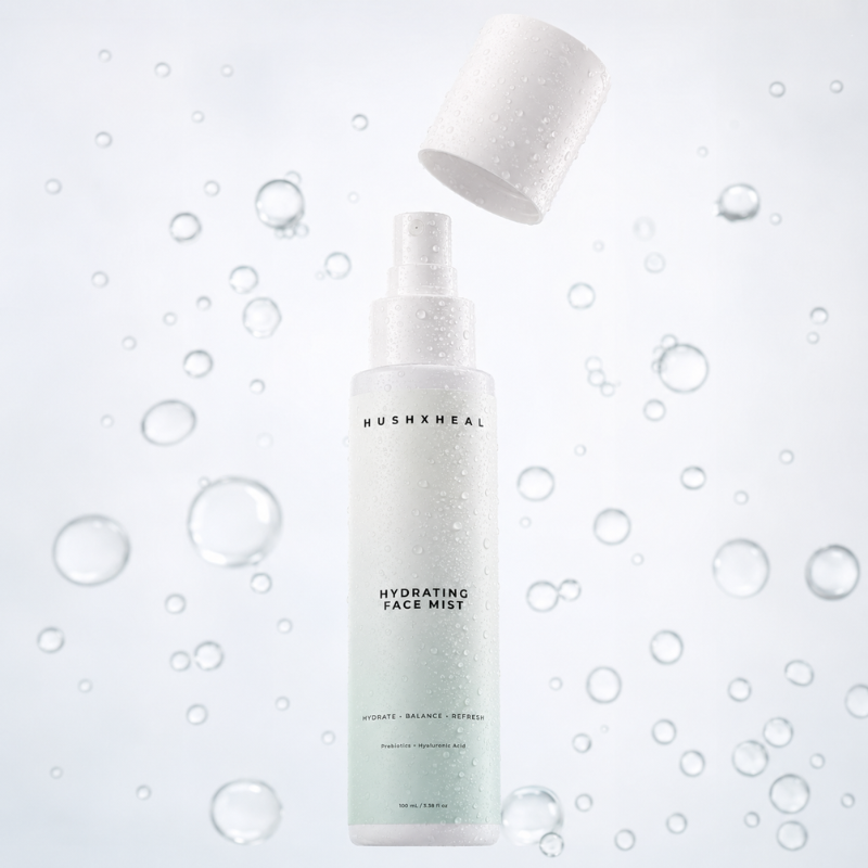 HUSHXHEAL Hydrating Face Mist bottle with water droplets and floating hydration bubbles on a clean white background.