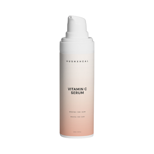 HUSHXHEAL Vitamin C Serum bottle on soft white background