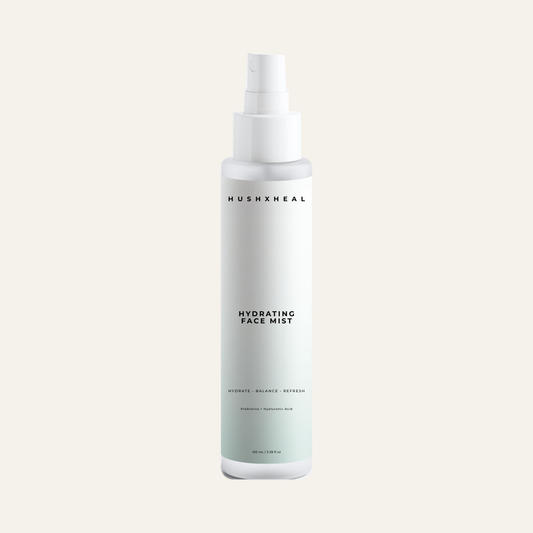 HUSHXHEAL Barrier Cloud Hydrating Face Mist spray bottle on a transparent background